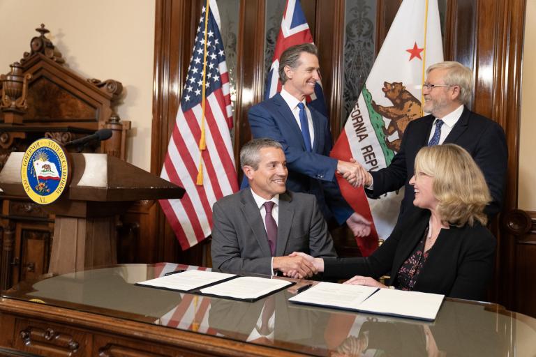 California Governor Gavin Newsom and Ambassador Kevin Rudd witness the signing of a landmark MoU between Australia and the state of California